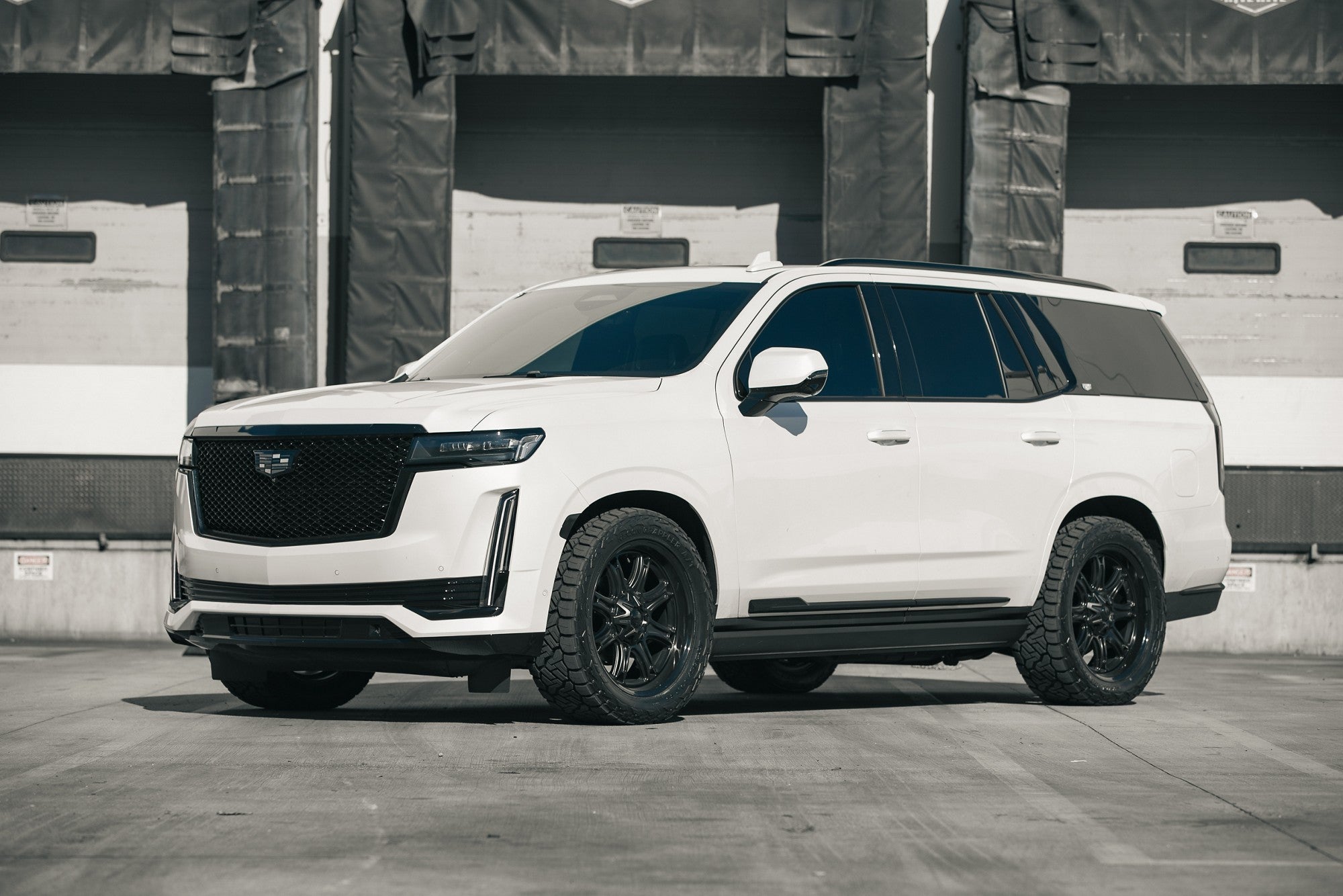 2022 Cadillac Escalade with Fuel Off-Road Darkstar wheels in Matte Black w/ Gloss Black Lip
