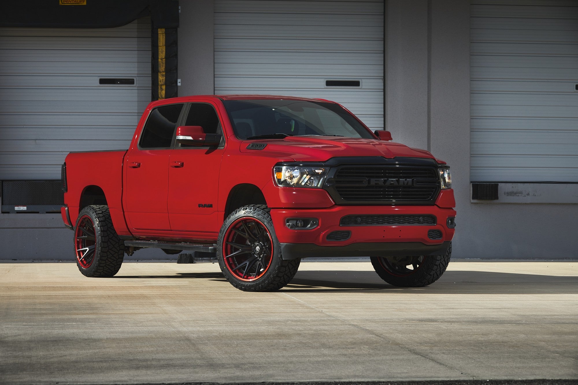 2020 Dodge Ram with Fuel Off-Road Catalyst wheels in Matte Black w/ Candy Red Lip