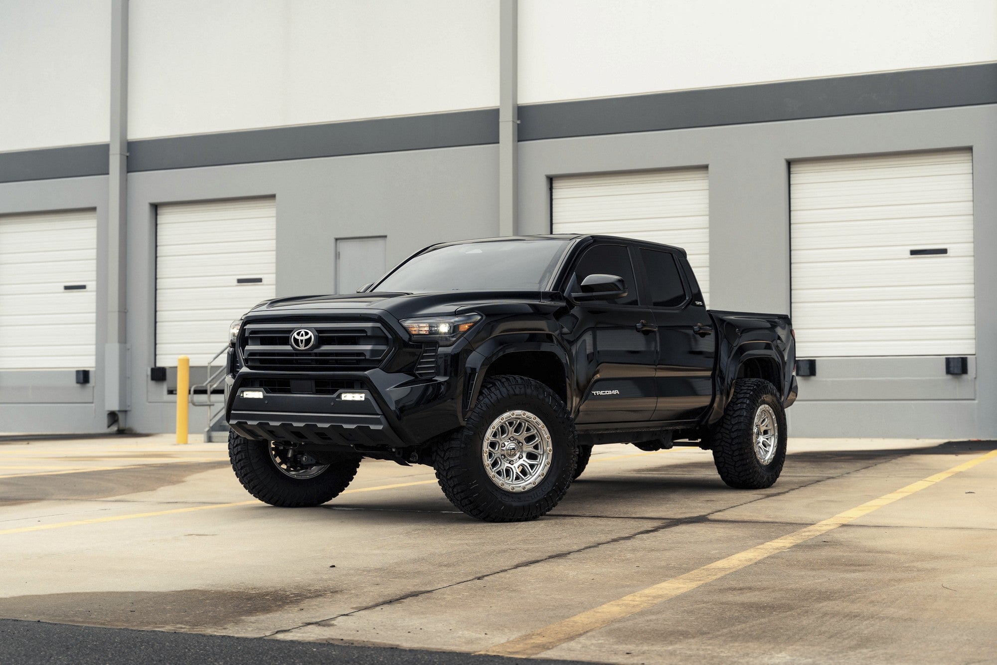 2024 Toyota Tacoma with Fuel Off-Road Surge wheels in Gloss Silver w/ Machined Face