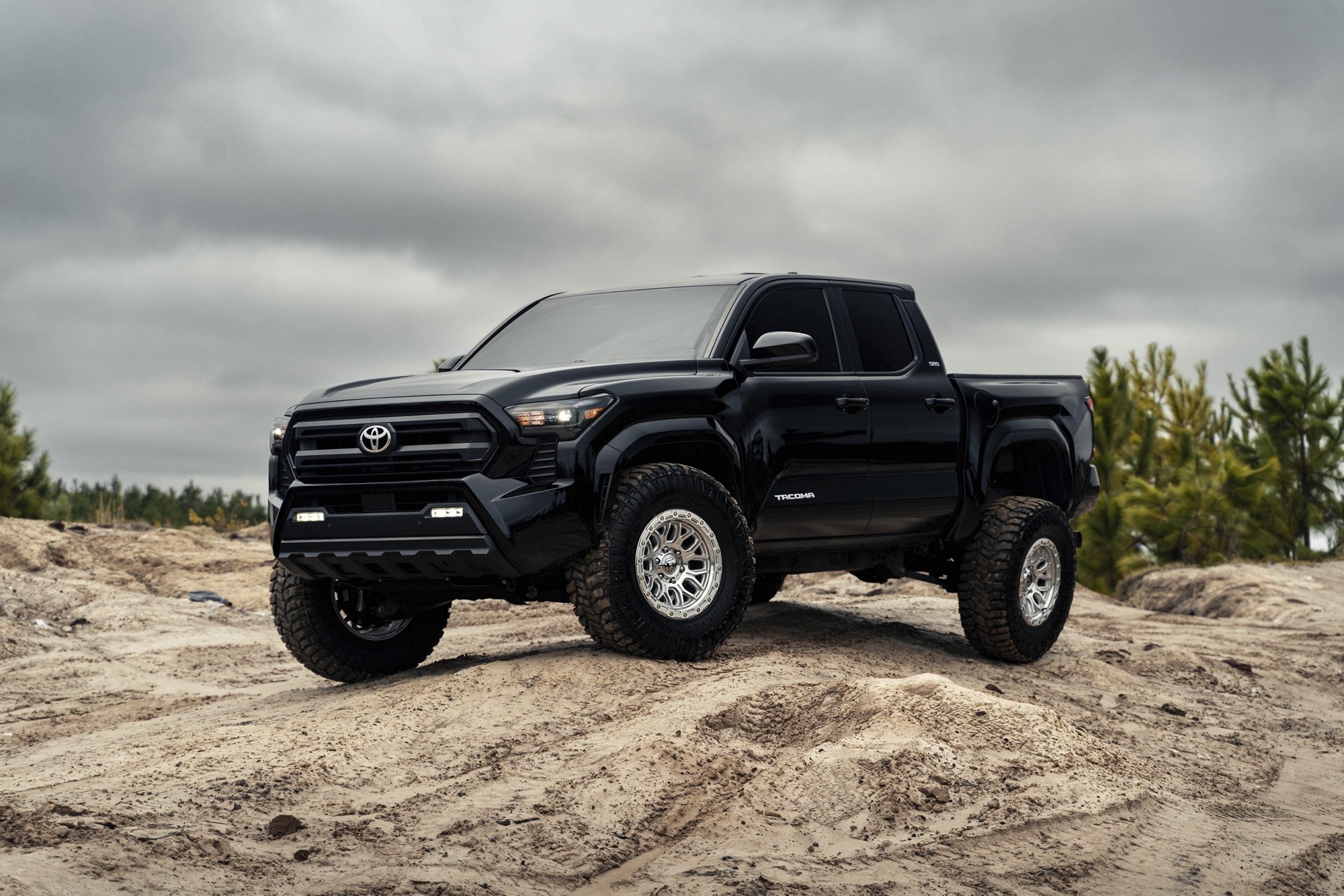 2024 Toyota Tacoma with Fuel Off-Road Surge wheels in Gloss Silver w/ Machined Face