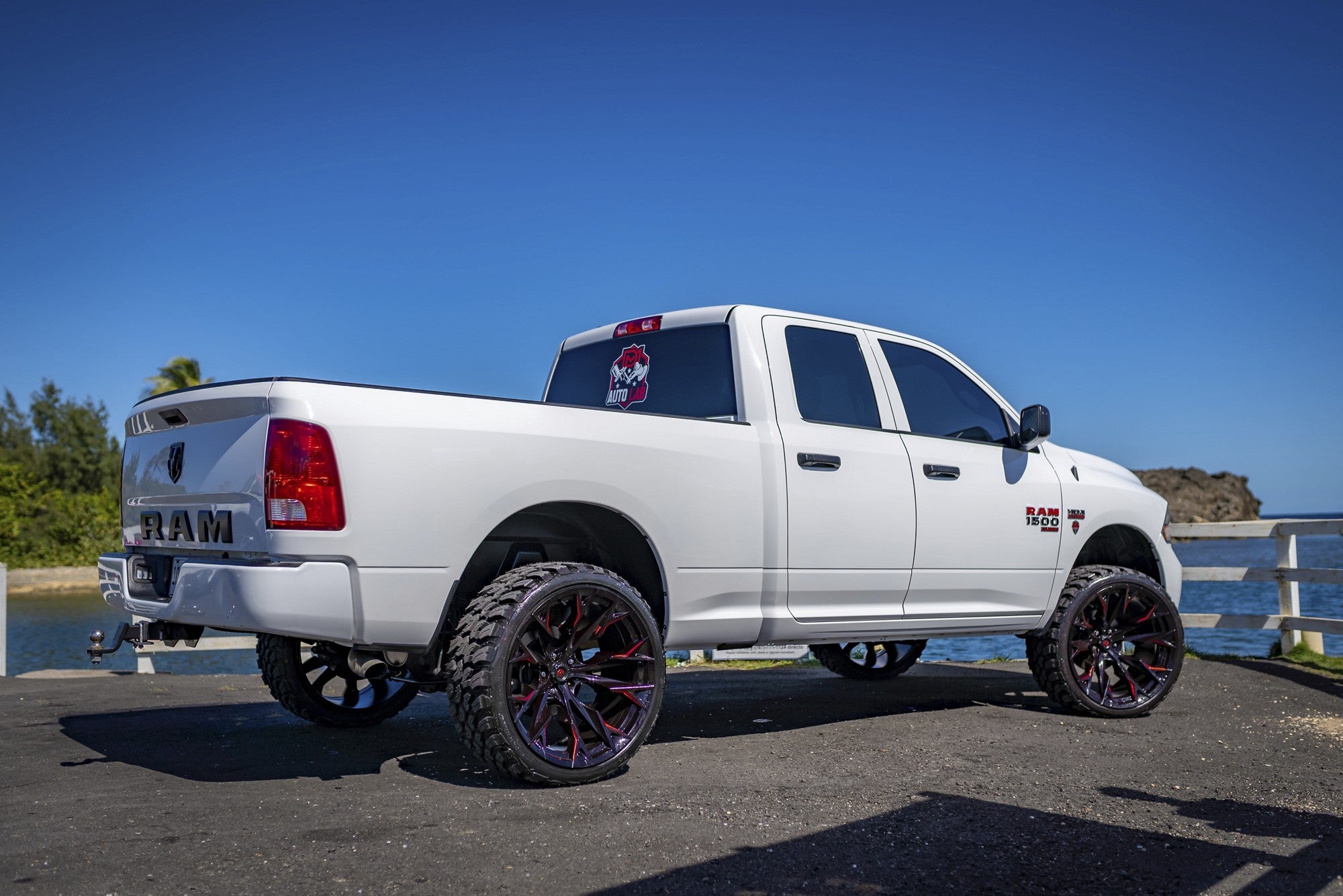 2019 Ram 1500 with Fuel Off-Road Flame wheels in Gloss Black Milled w/ Candy Red