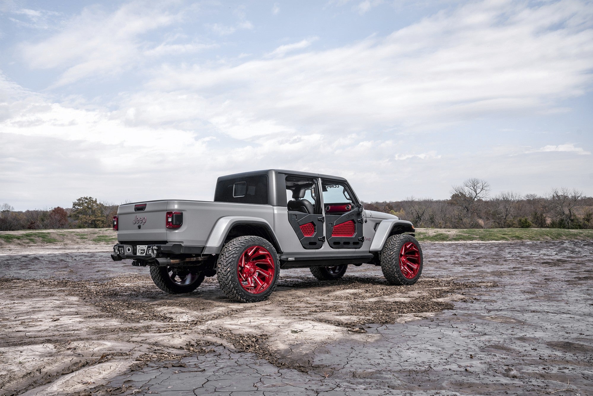 2020 Jeep Gladiator with Fuel Off-Road Reaction wheels in Candy Red Milled