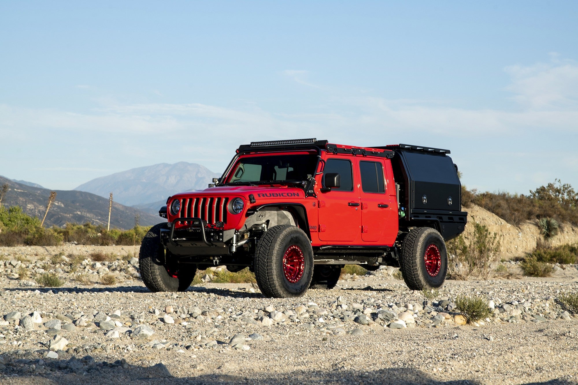 2021 Jeep Gladiator with Fuel Off-Road Rincon beadlock wheels in Candy Red