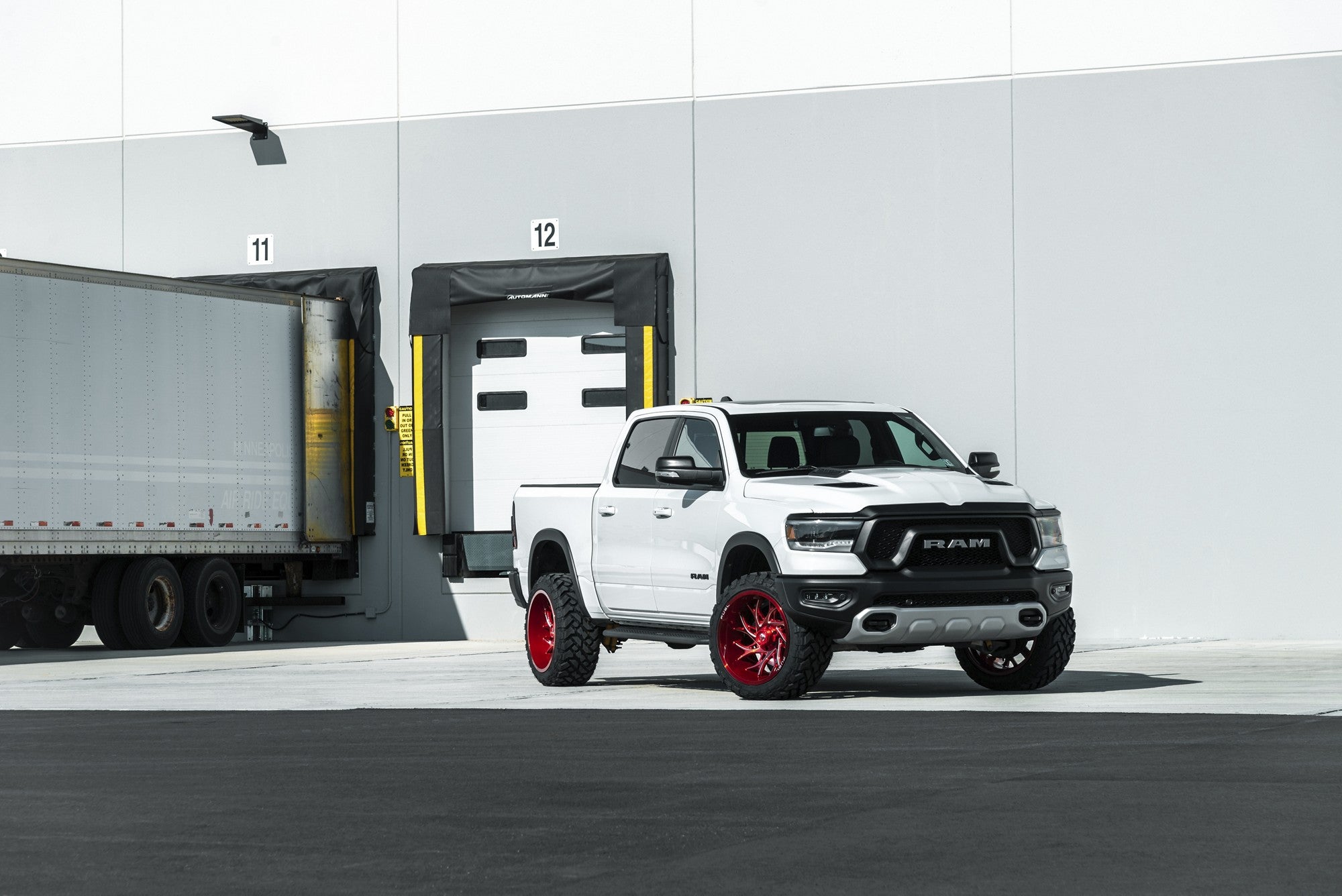 2020 Ram 1500 with Fuel Off-Road Runner wheels in Candy Red Milled
