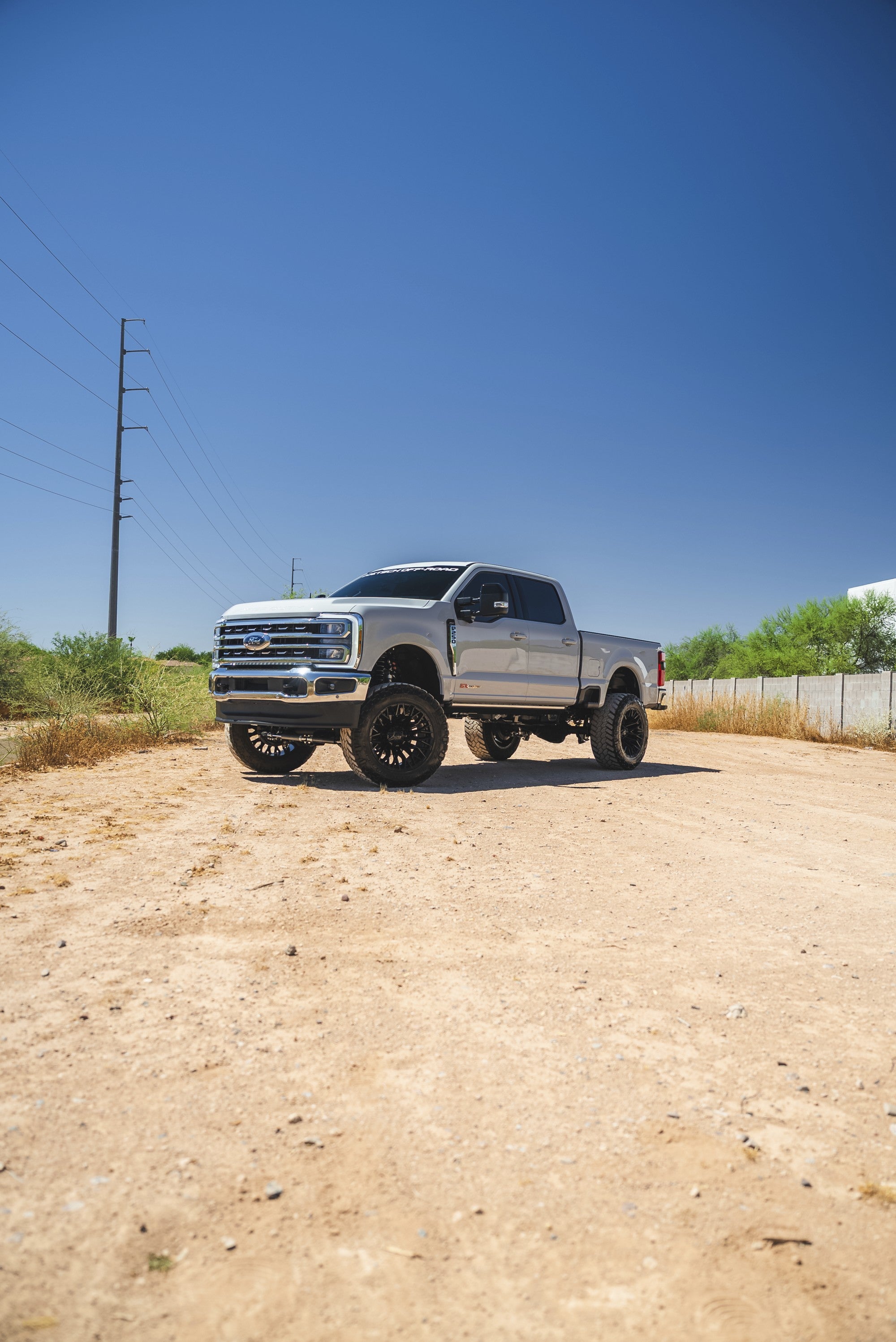 2024 Ford F250 with Fuel Off-Road Strike wheels in Gloss Black