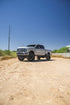 2024 Ford F250 with Fuel Off-Road Strike wheels in Gloss Black