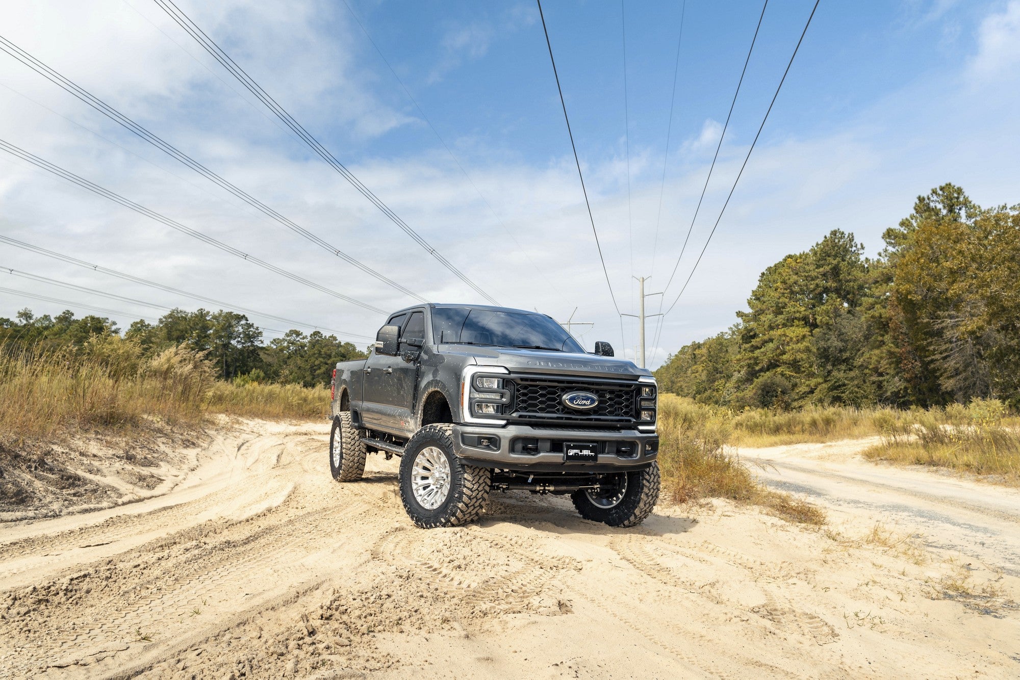 2024 Ford F250 with Fuel Off-Road Trax wheels in Gloss Silver w/ Machined Face