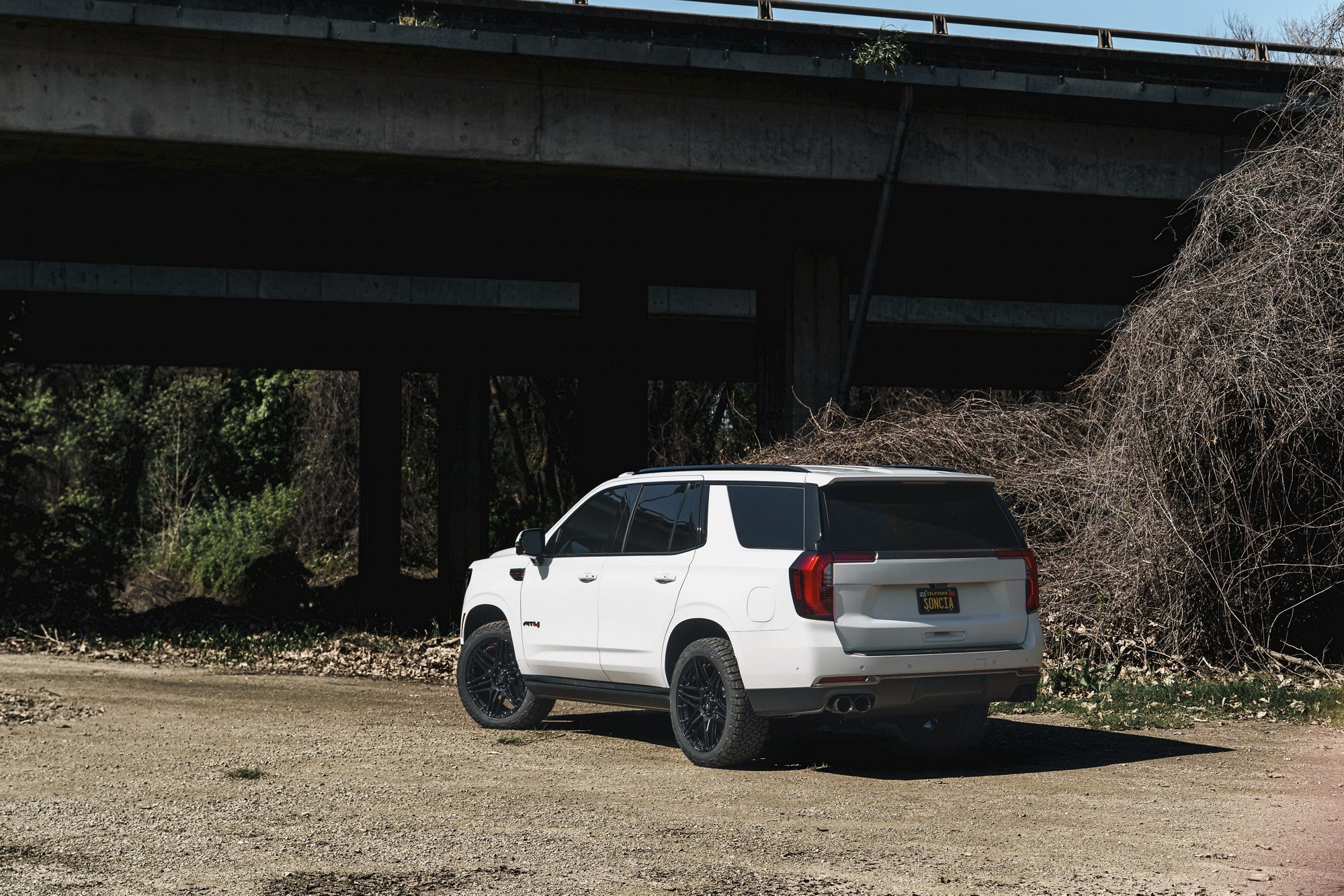 2024 GMC Yukon with Fuel Off-Road Weapon wheels in Gloss Black