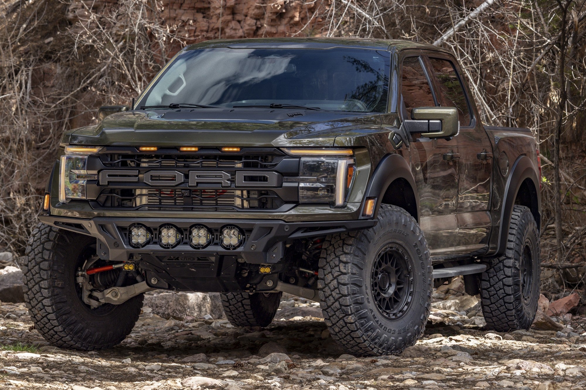 2025 Ford F150 Raptor with KMC Attack wheels in Matte Black