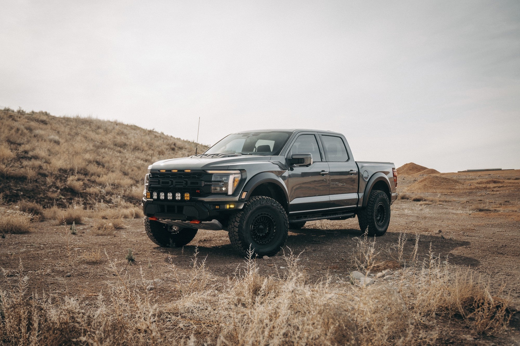 2026 Ford F150 Raptor R with KMC Aztec wheels in Matte Black w/ Gloss Black Lip