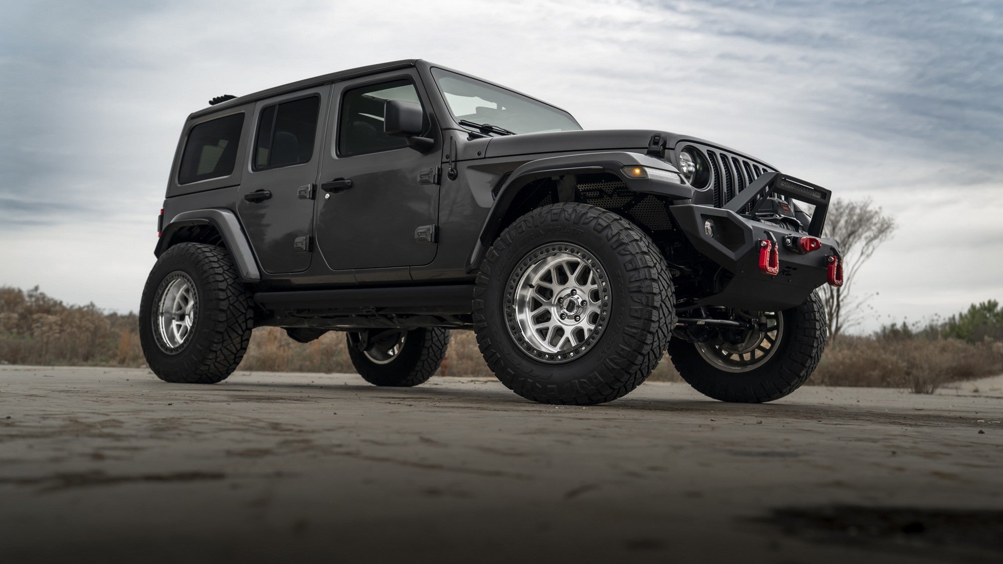 2019 Jeep Wrangler with KMC Grenade Crawl Beadlock wheels in Machined