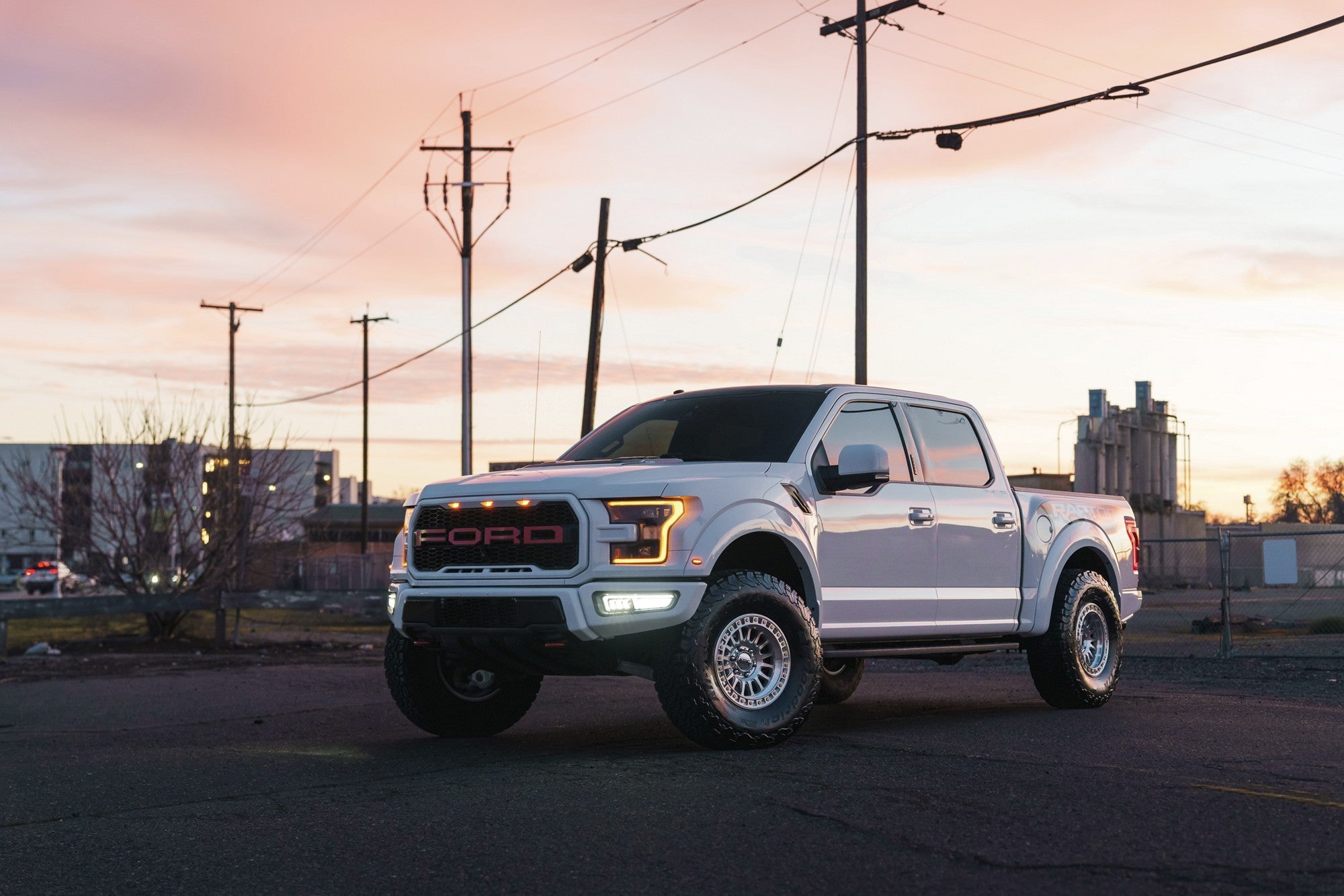 2025 Ford F150 Raptor with KMC IMS wheels in Gloss Silver w/ Machined Face