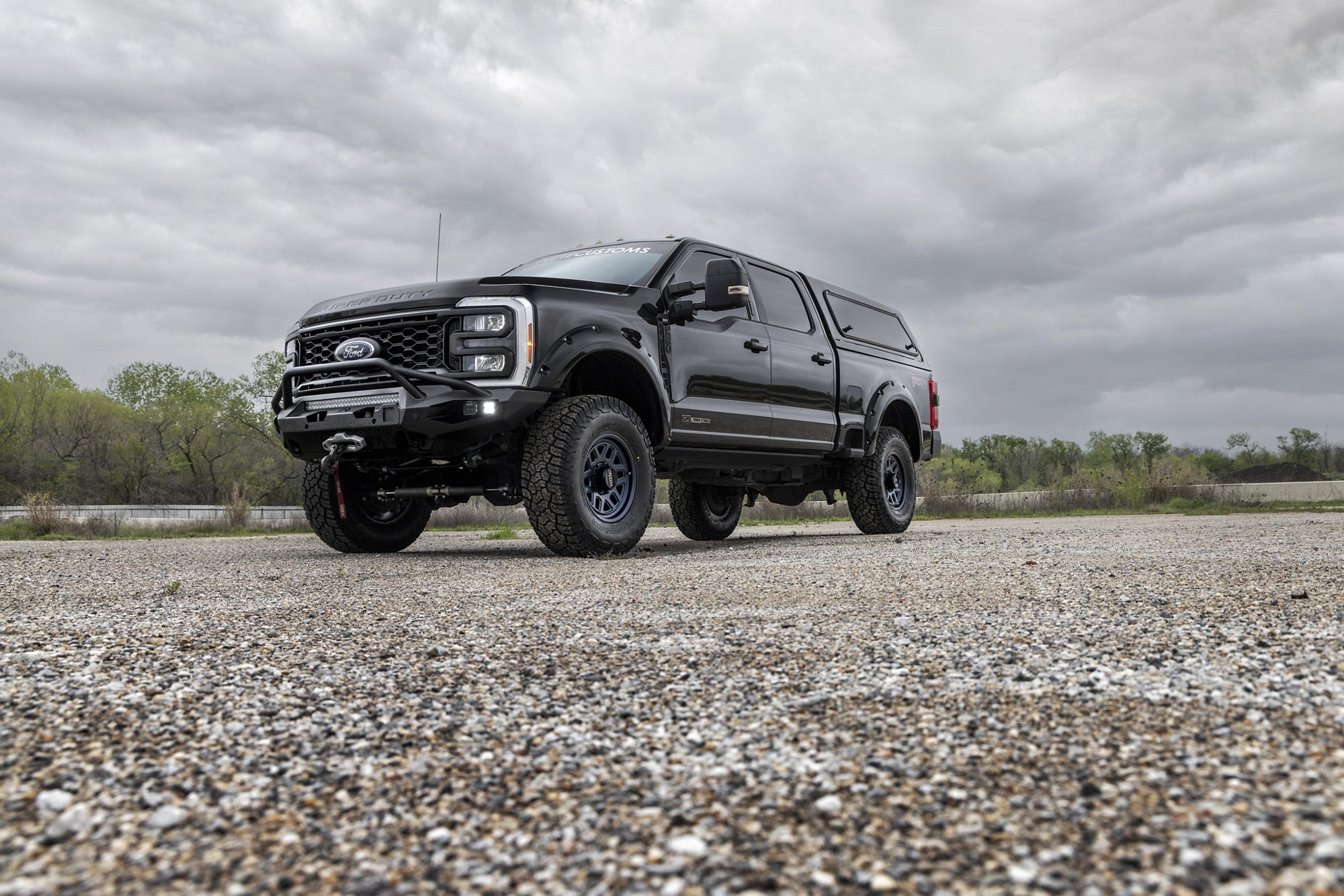 2024 Ford F250 with KMC Mesa Forged Monoblock wheels in Metallic Blue