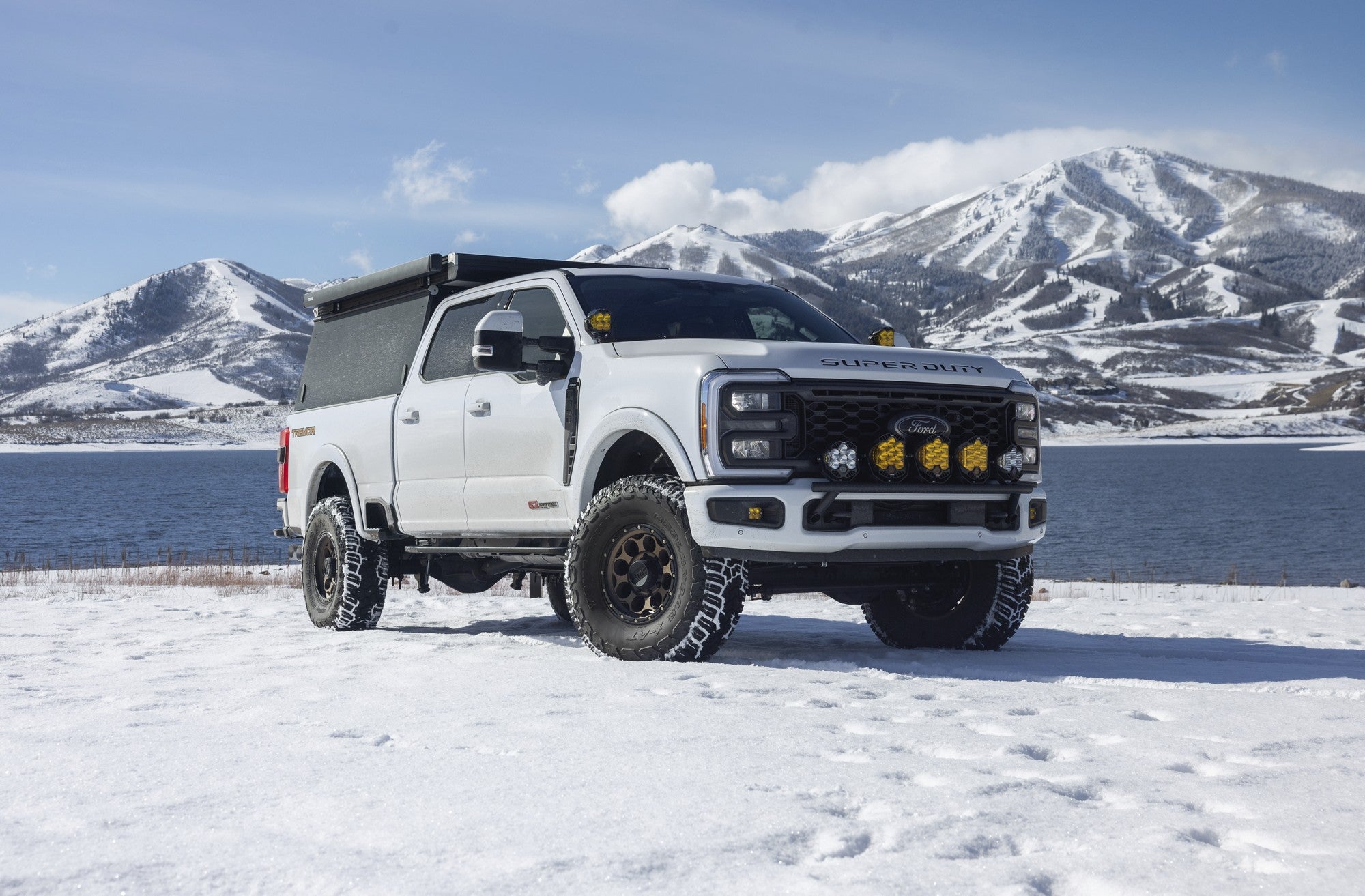 2023 Ford F250 Tremor with KMC Dirty Harry wheels in Matte Bronze w/ Black Lip