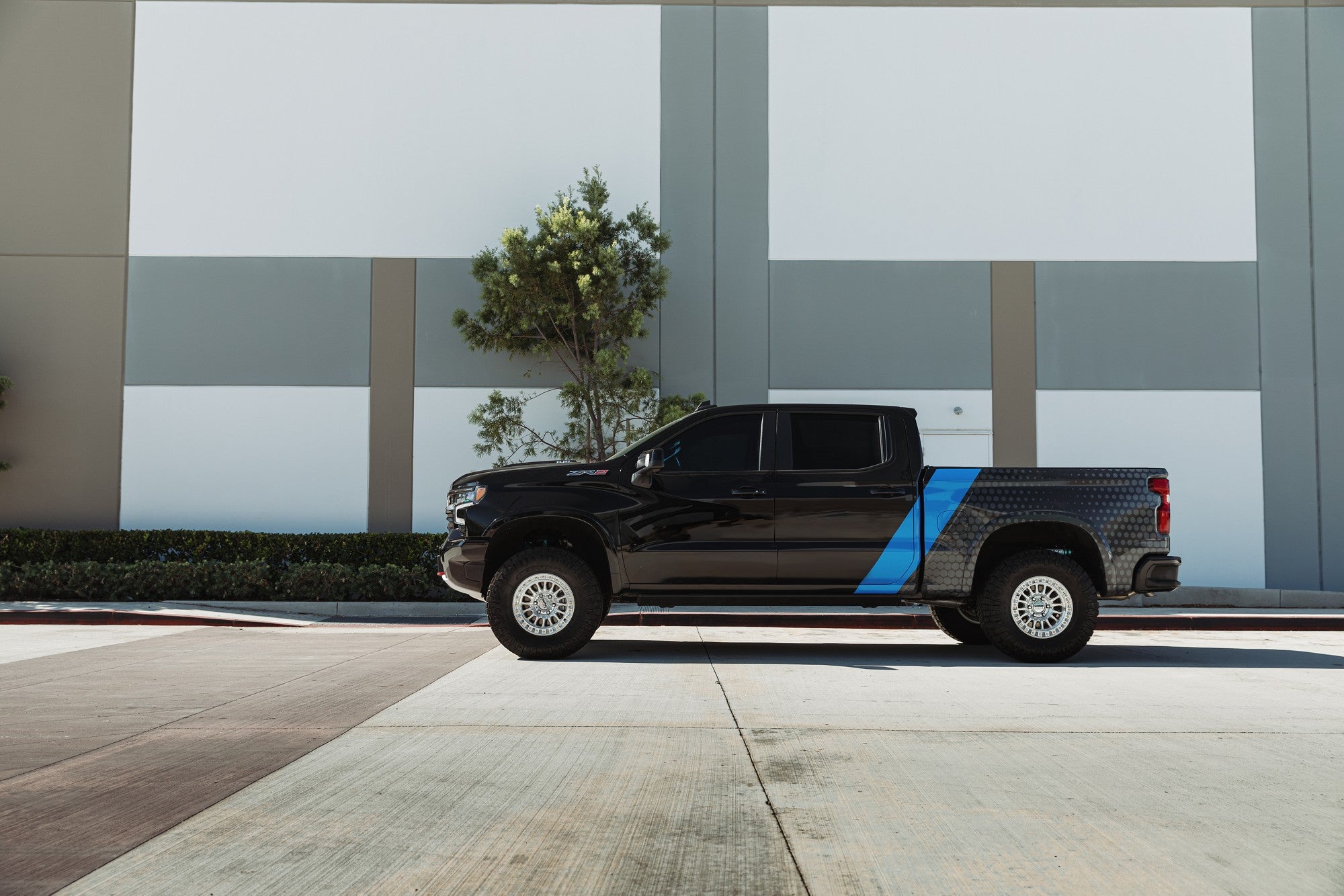 2020 Chevrolet Silverado with KMC IMS wheels in Gloss Silver w/ Machined Face