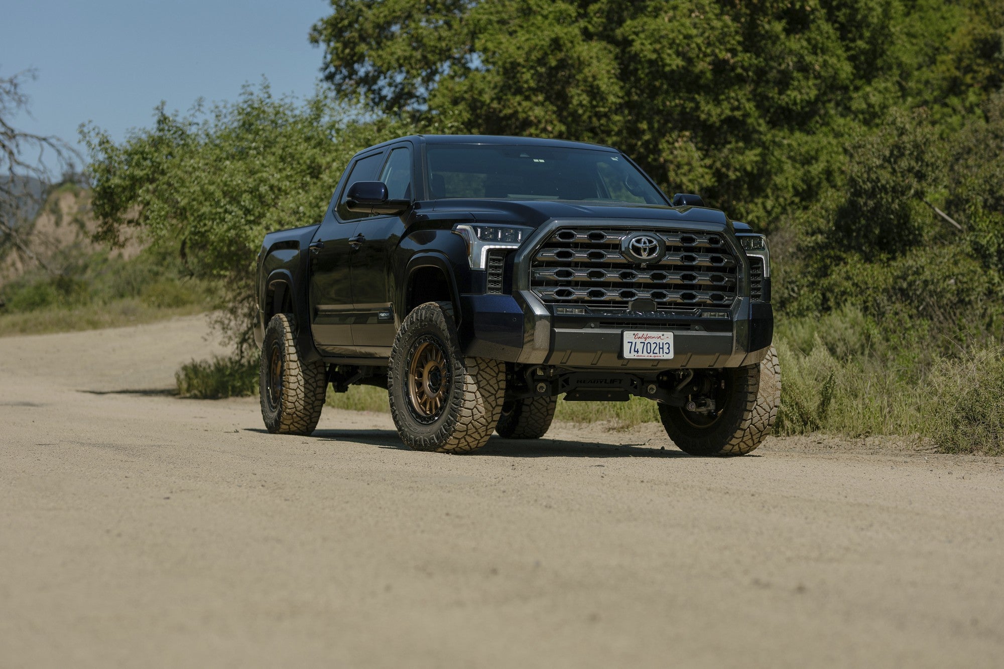 2022 Toyota Tundra with KMC IMS wheels in Matte Bronze w/ Gloss Black Lip