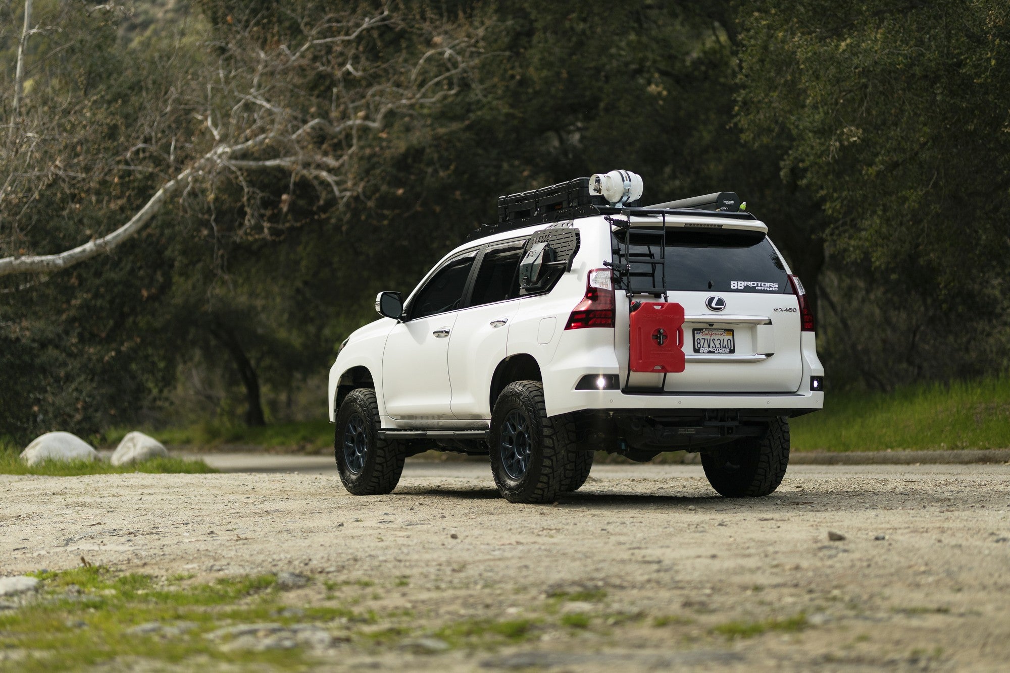 2022 Lexus GX460 with KMC Hatchet wheels in Metallic Blue