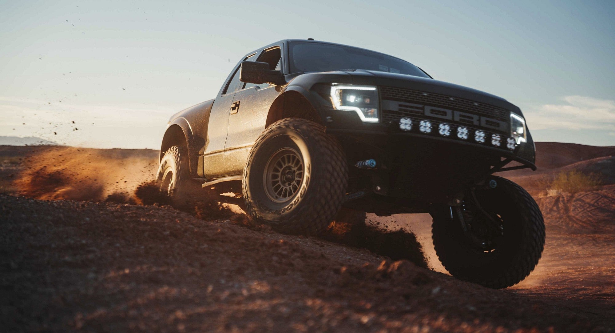 2010 Ford F150 Raptor with KMC Impact FFT wheels in Matte Bronze