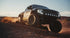 2010 Ford F150 Raptor with KMC Impact FFT wheels in Matte Bronze