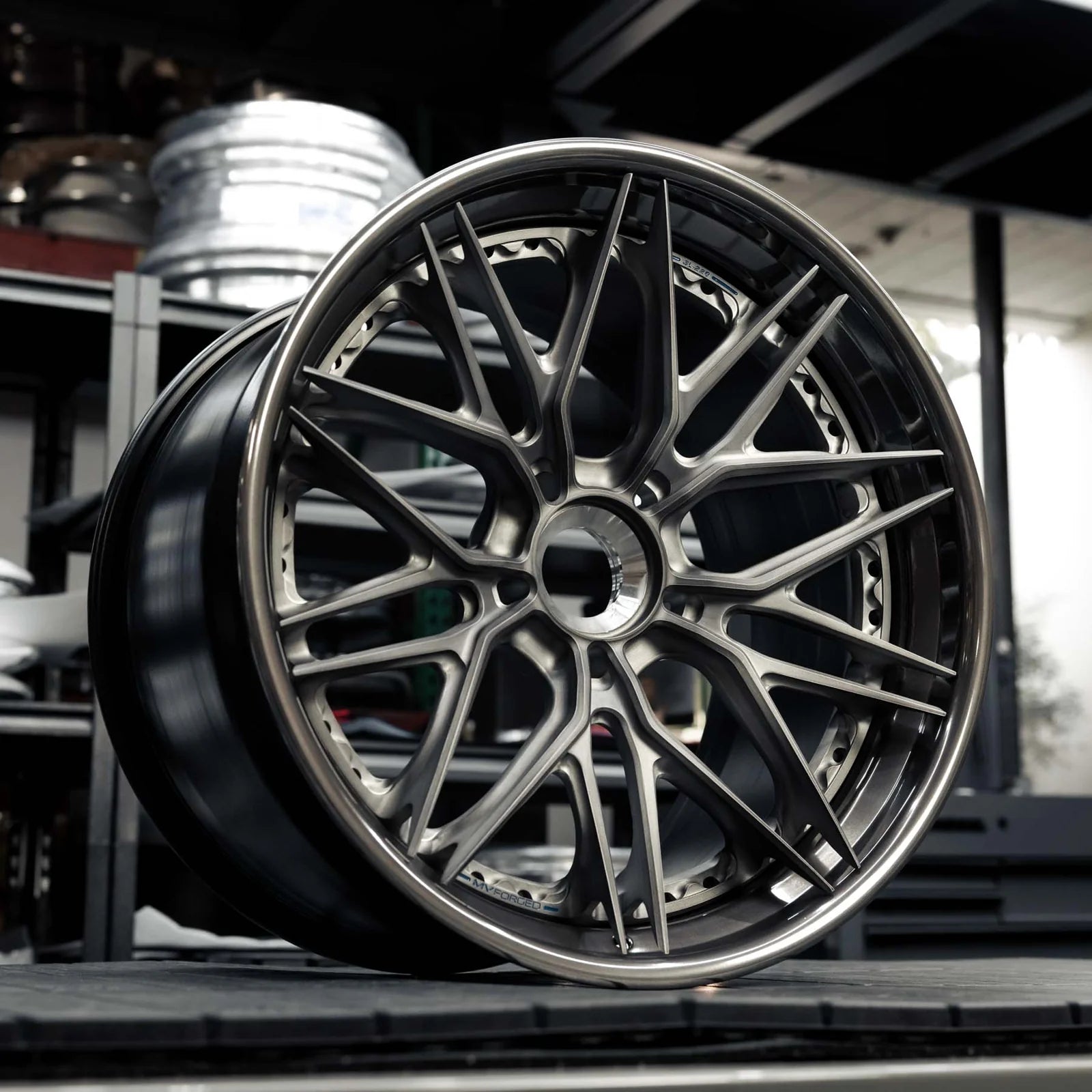 MV Forged SL-220 Spoke-Lite forged wheel, 3-piece in a gunmetal finish on display