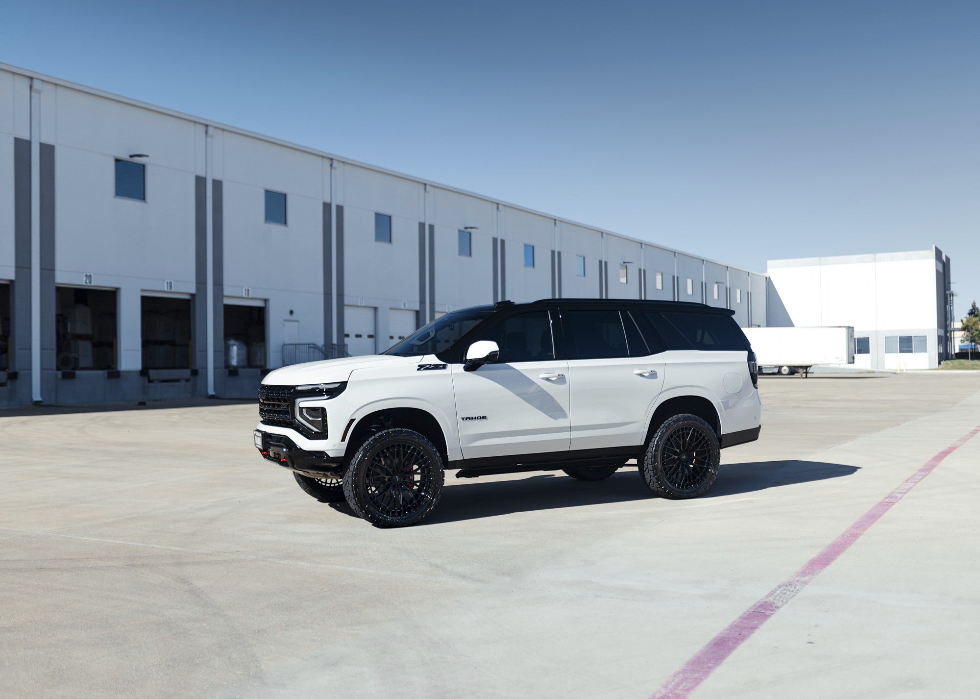 2025 Chevrolet Tahoe with Niche Genoa wheels in Gloss Black