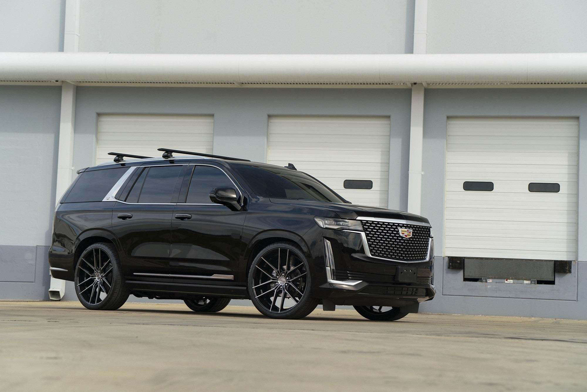 2024 Cadillac Escalade with Niche Prodigy 6 wheels in Gloss Black Dark Tinted Clear