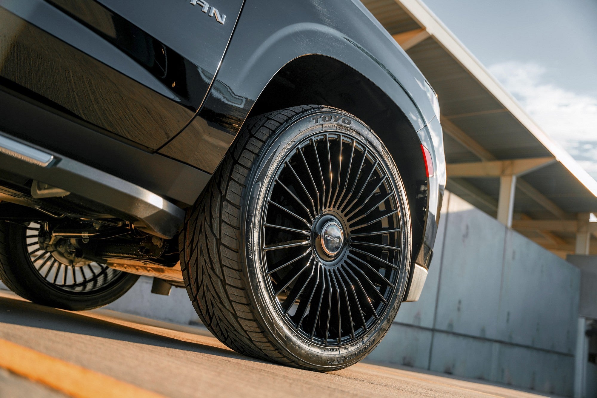 2023 Chevrolet Suburban with Niche Serene wheels in Gloss Black