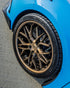 Rohana RFC3 Machine Bronze on a Blue C8 Corvette