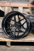Rohana RFG26 forged wheel in double black with purple hardware