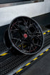 Rohana RFG29 forged wheel in gloss black with a carbon fiber lip