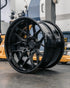 Rohana RFG7 forged wheel in satin black with a gloss black lip, angled view
