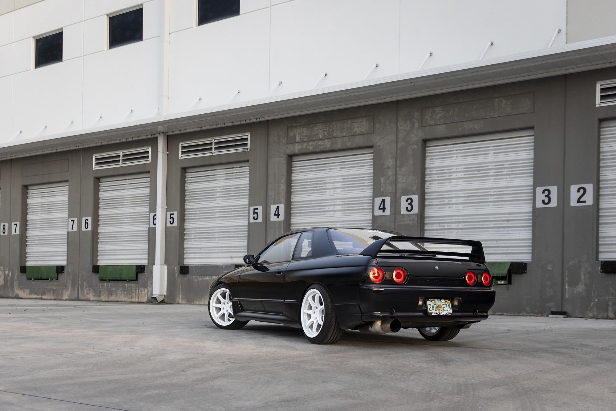 Nissan Skyline R34 with Rotiform BPU wheels in Gloss White